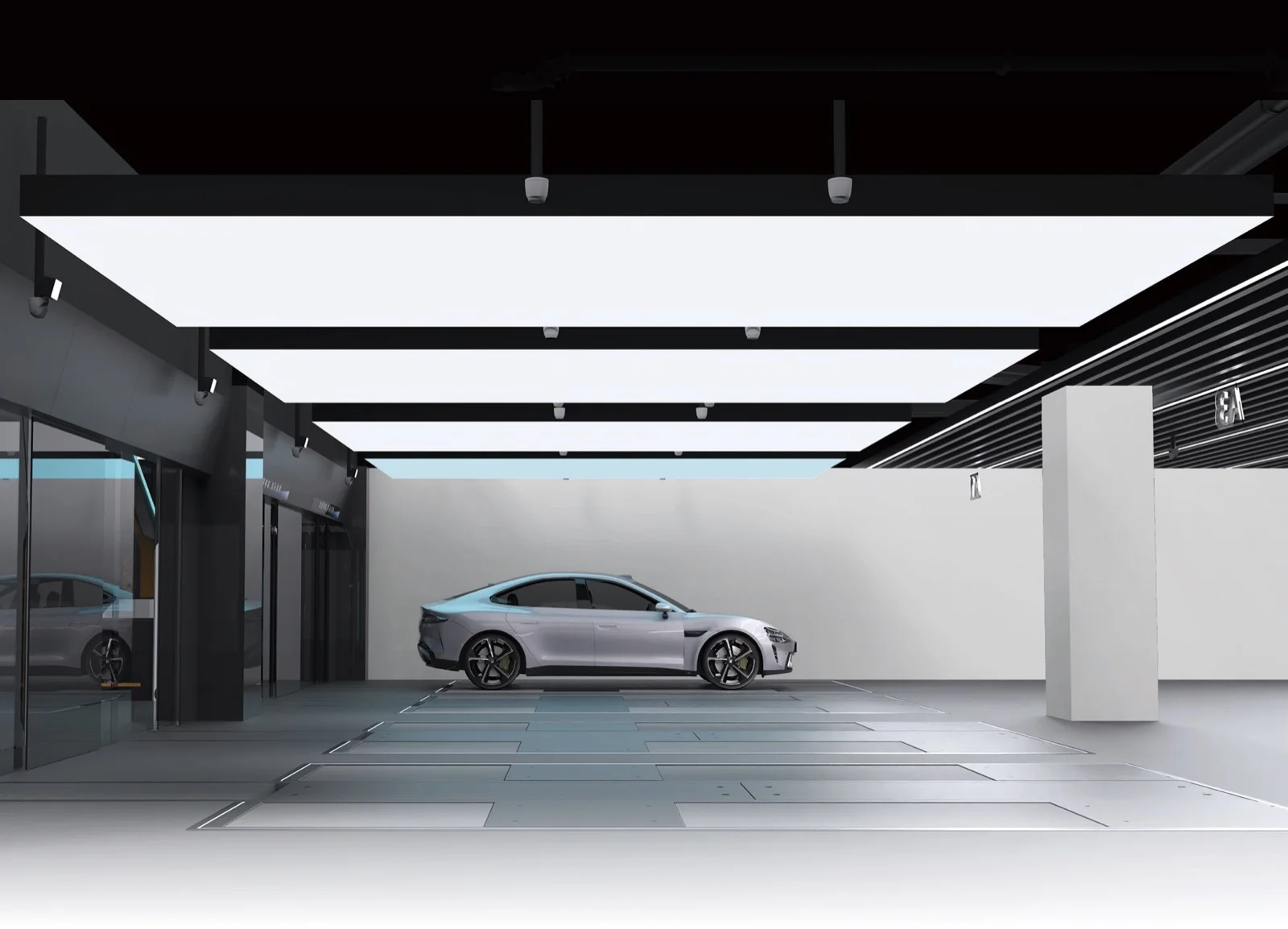An electric vehicle parked on a StackCharge automated bay, ready for robotic positioning and charging